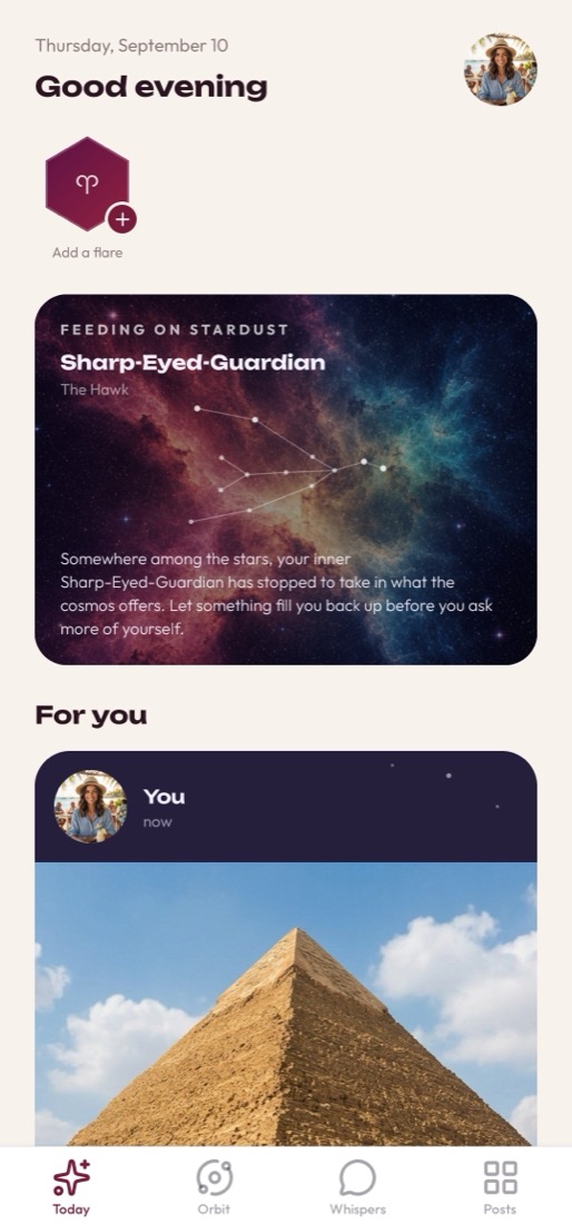 The Today screen showing a spirit animal constellation card and a personal Cosmic Cue